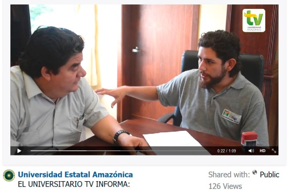 The rector of the Universidad Estatal Amazonica, Dr Julio Cesar Vargas (left) and EcoMinga's Juan Pablo Reyes sign a five-year agreement of scientific and educational cooperation in Puyo last week.  A screen capture  from the Universidad Estatal Amazonica's TV channel; click here for the video. announcement.