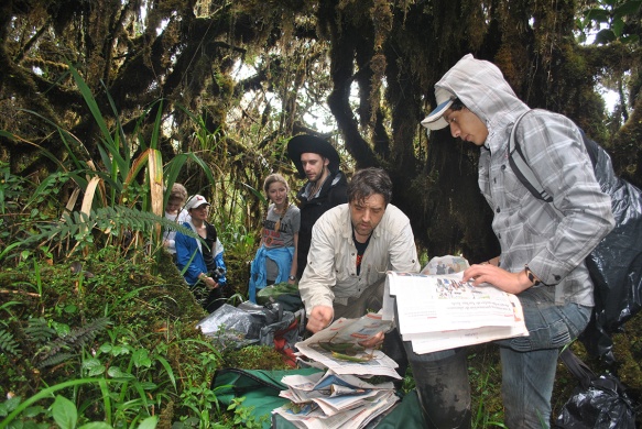 John and Darwin processing the collections of plant specimens in the quarter-hectare plot. Photo: EcoMinga staff.